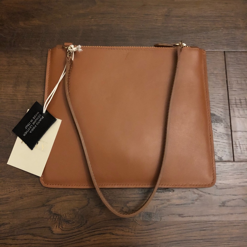 Genuine leather clutch/pochette Punto Fibbia